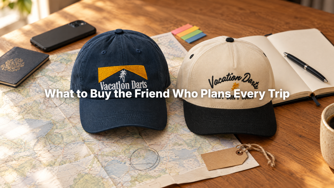 Vacation Darts hats on a trip planner's desk with a map and passport