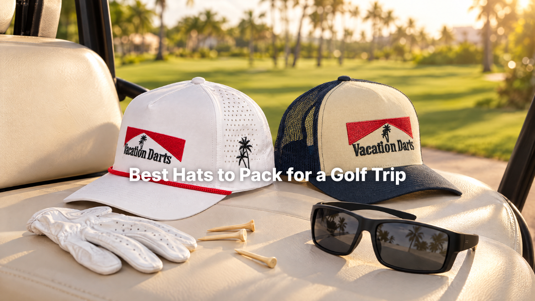 Vacation Darts golf hat and trucker hat on a golf cart at a resort course