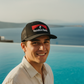 Black Santiago Trucker Hat - Aegean Pool Lifestyle (Enhanced)